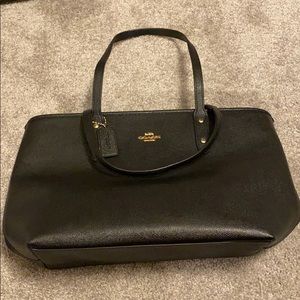 Black coach purse with gold details